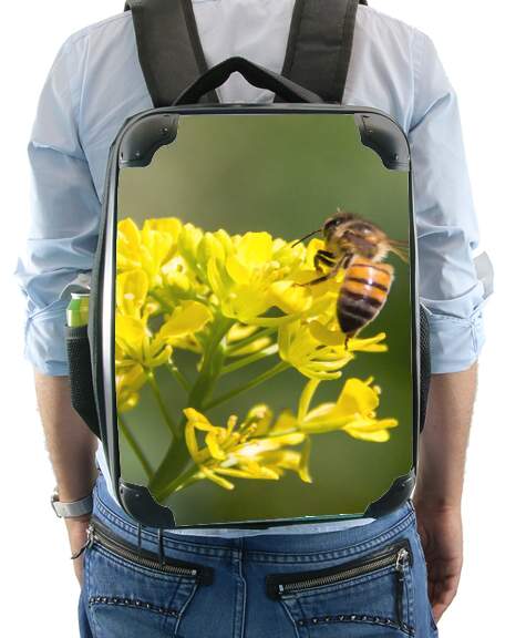 A bee in the yellow mustard flowers for Backpack